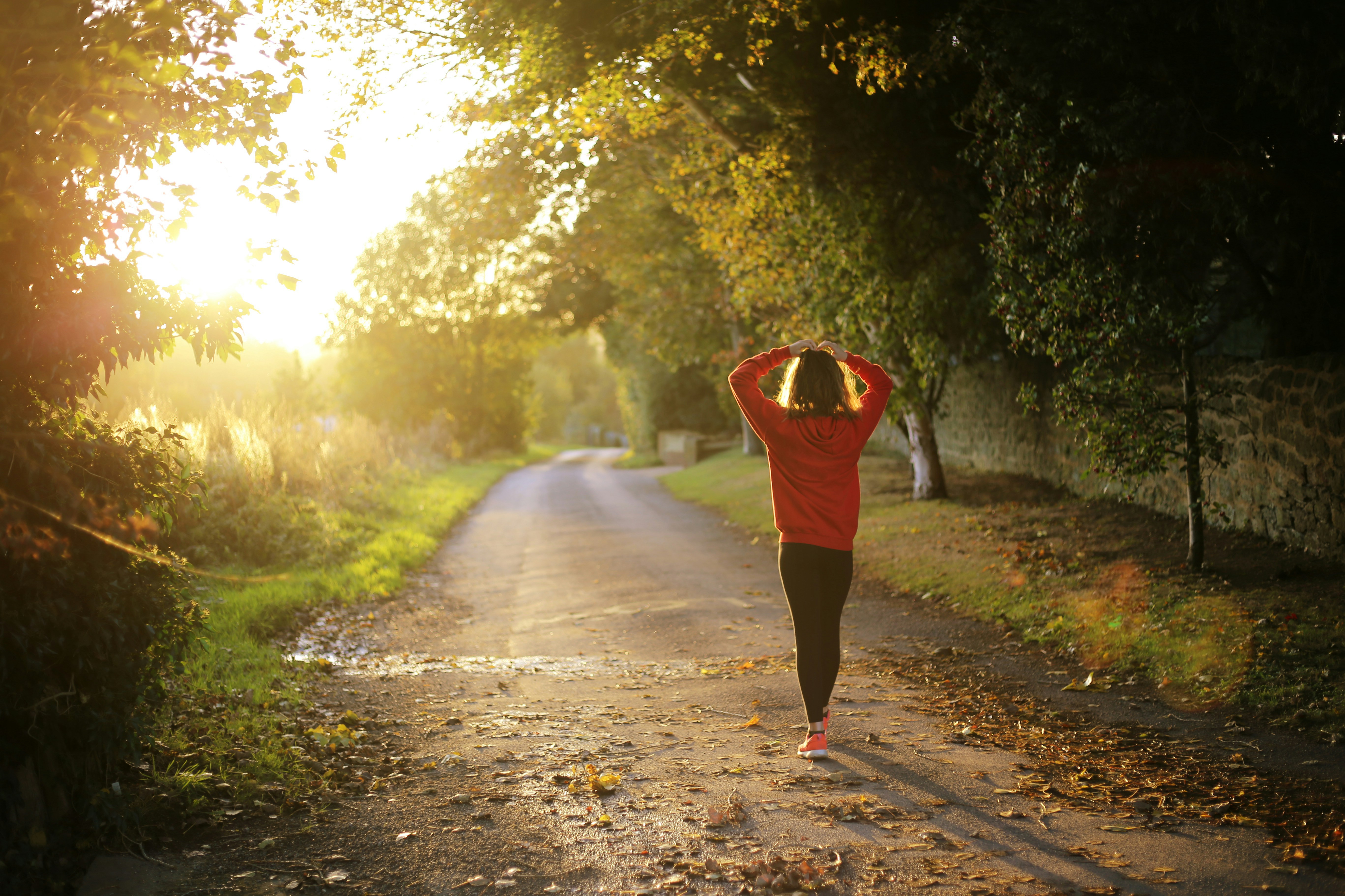 Woman walking outdoors in natural light